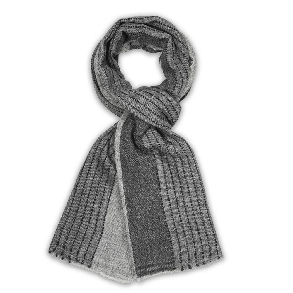 A gray knit scarf with vertical dotted stripes and a lighter gray solid panel, styled in a loop on a white background.
