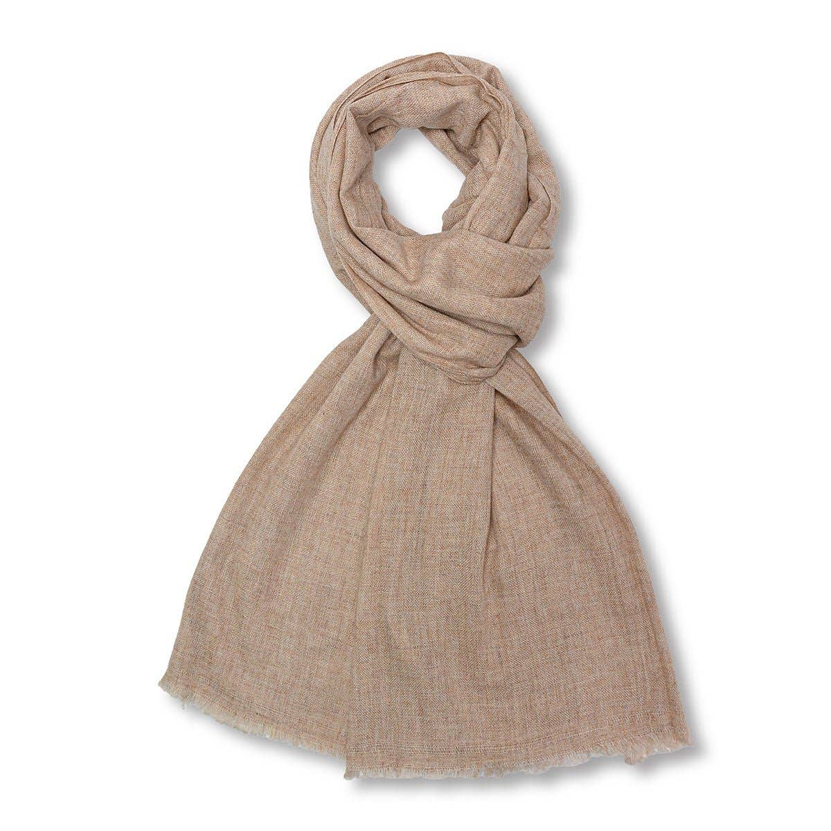 A light beige scarf with a soft, textured weave, styled in a looped knot on a clean white background.
