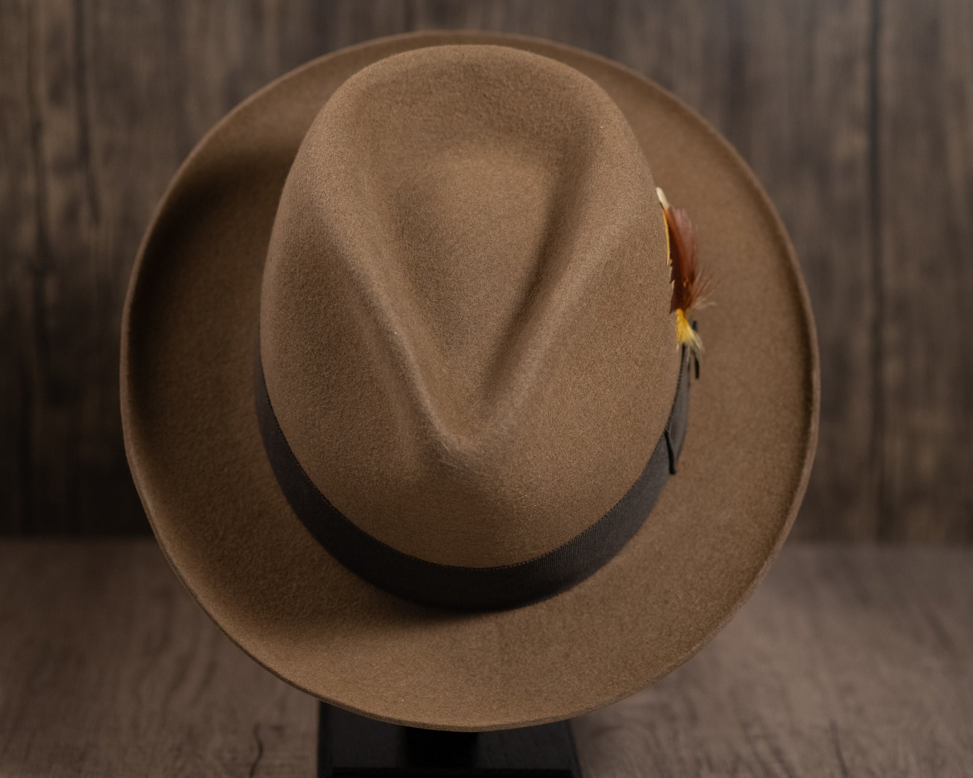 camel-colored fur felt hat